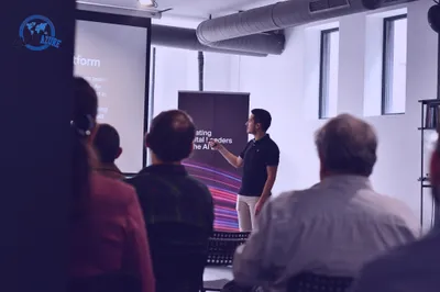 Radoslav speaking at a tech event